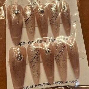 Armour Charm Nail Set – Nude Stiletto with Glitter & Line‎ Art (Medium)